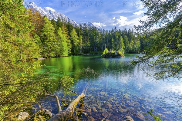 Lake Badersee in spring with Zugspitze group 2962m in the Wetterstein mountains, Zugspitz village