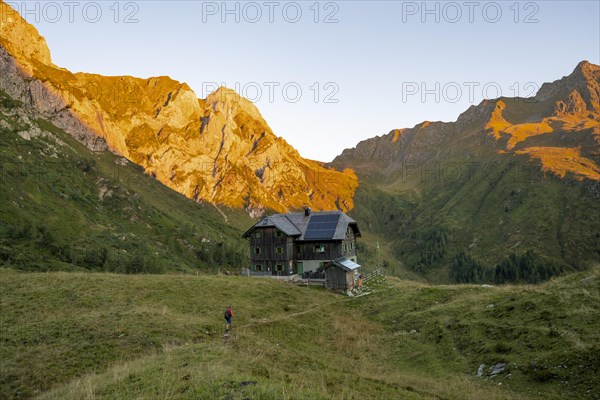Alpine club hut, Hochweisssteinhaus mountain hut, mountain landscape with green mountain meadows