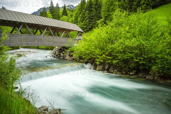 Covered wooden bridge over the Stillach, Stillachtal near Oberstdorf, Allgaeu Alps, Allgaeu,