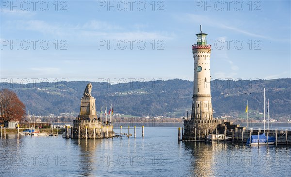 Harbour entrance of Lindau harbour, pier with New Lindau Lighthouse and Bavarian Lion, in the
