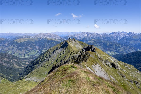 Grassy mountain ridge and view of the Lesach Valley, mountain panorama, Carnic High Trail, Carnic