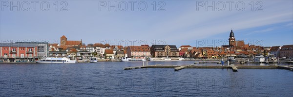 Town panorama with town harbour on Lake Mueritz, St. Georgen Church and St. Marien Church, Waren,