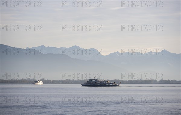 Excursion boat on Lake Constance, snow-covered mountain peaks, Lindau Island, Lake Constance,