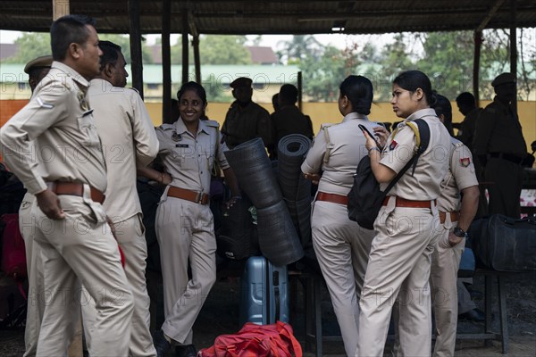 Barpeta, India. 6 May 2024. Police personnels arrives with luggage to leave for allocated polling