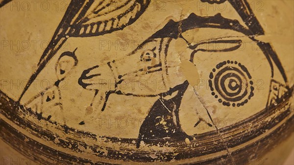 DetaiAntique vase with a picture of figures and animals, designed in black on a beige background,
