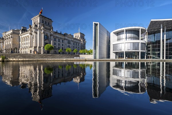 Reichstag, Paul Loebe House reflected in the Spree, Berlin, Germany, Europe