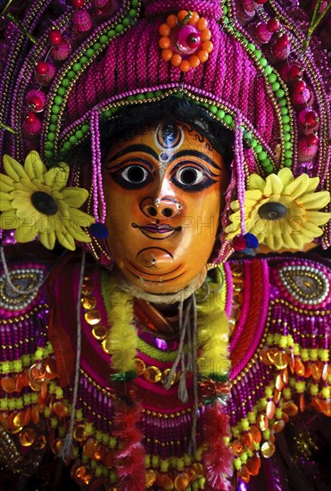 Portrait of a Purulia Chhau dancer playing the role of the hindu goddess Durga, West Bengal, India,