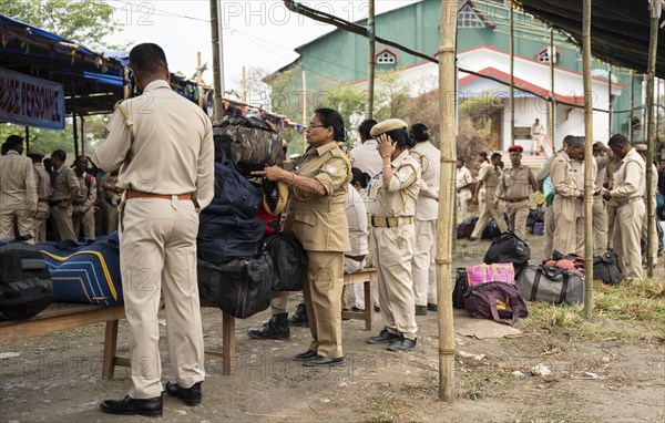 Barpeta, India. 6 May 2024. Police personnels arrives with luggage to leave for allocated polling