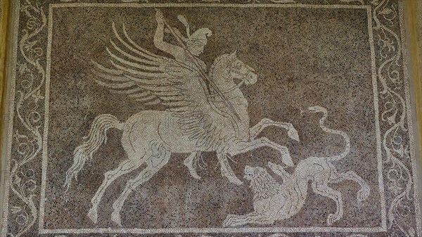 Ancient mosaic with Bellerophon on horse Pegasus fighting a chimera, showing mythological scenes,