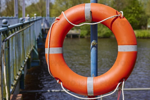 Lifebuoy at the Blue Bridge in Friedrichstadt, Nordfriesland district, Schleswig-Holstein, Germany,