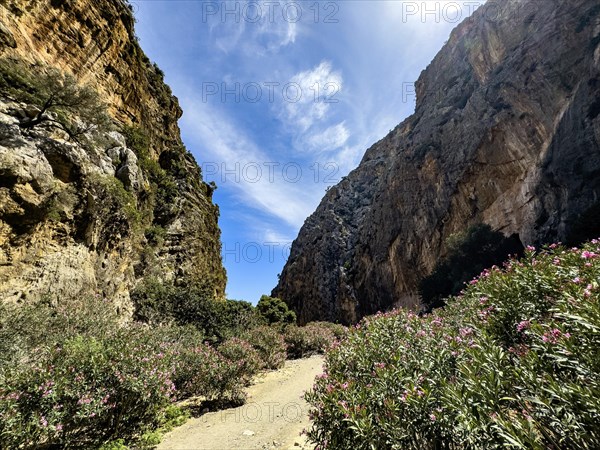 View of gorge with path hiking trail for trekking in Agiofarago gorge of the saints on south coast