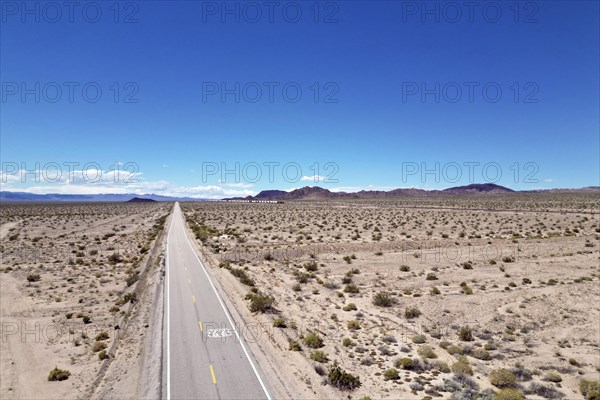 Drone shot of Route 66 with Route 66 sign on the road, Mojave Desert, California
