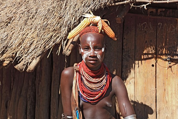 South Ethiopia, Omo region, among the Karo people, young woman, girl with jewellery and face