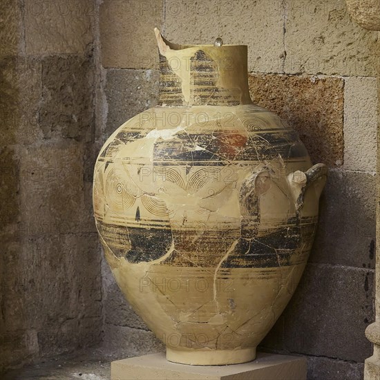Large antique vase with detailed pattern and golden colour, stone-like, interiors, Archaeological