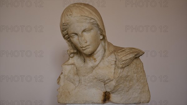 Bust of a woman, A marble bust depicting a person with a melancholic expression, Interiors,