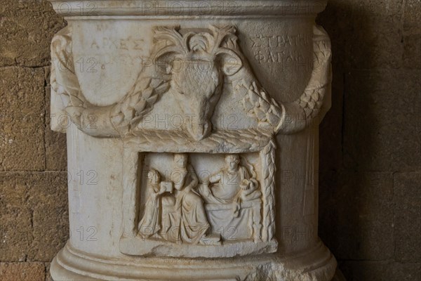 Ancient relief in a stonework with carved figures and a scene, interiors, Archaeological Museum,