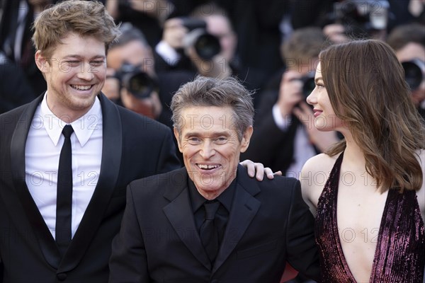 Cannes, France, 17.5.2024: Joe Alwynbei, Willem Dafoe and Emma Stone at the premiere of Kinds of