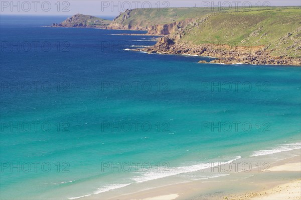 Wide sandy beach, cliffs and green countryside, Sennen Bay, Cornwall, Great Britain