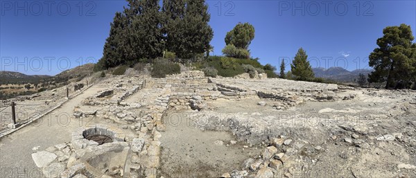 Panoramic view of part of excavation site on hill of Phaistos with foundations of Roman building