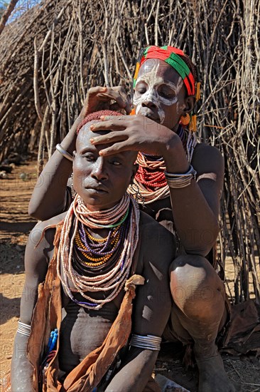 South Ethiopia, Omo region, among the Karo people, woman with jewellery and face painting styling