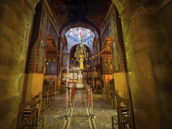 View into chancel interior of orthodox church with chandelier in the background Chandelier under