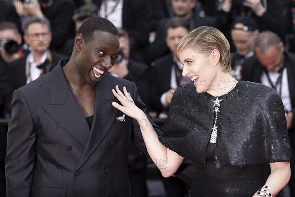Cannes, France, 16.5.2024: Omar Sy and Greta Gerwig at the premiere of Megalopolis on the red