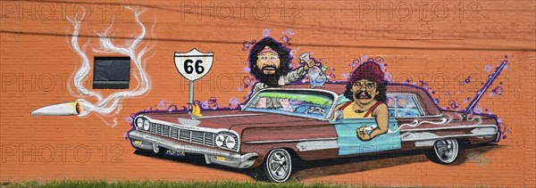 Mural on Route 66 of two stoners in a car, USA, North America