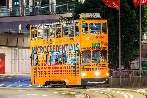 Hong Kong Tramway double-decker public transport on Des Voeux Rd in Hong Kong, China, Asia