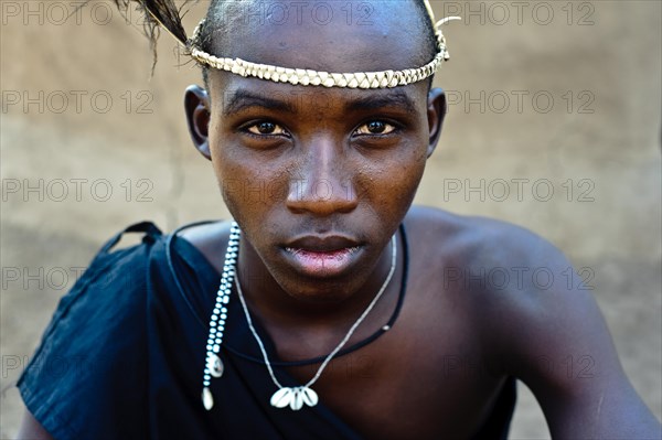 Portrait of a teenage boy following his initiation rite, teen from the Njemps tribe, Kenya. Once