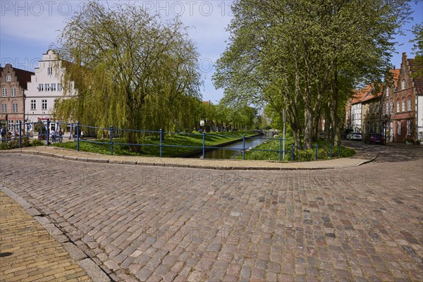 The Great Bridge over the Mittelburggraben with gabled houses and cobbled street in Friedrichstadt,