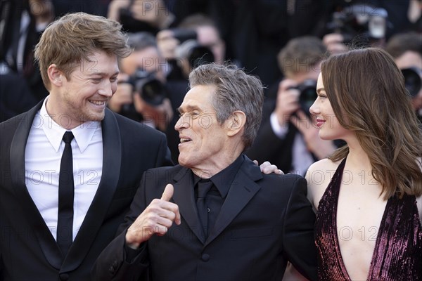 Cannes, France, 17.5.2024: Joe Alwynbei, Willem Dafoe and Emma Stone at the premiere of Kinds of