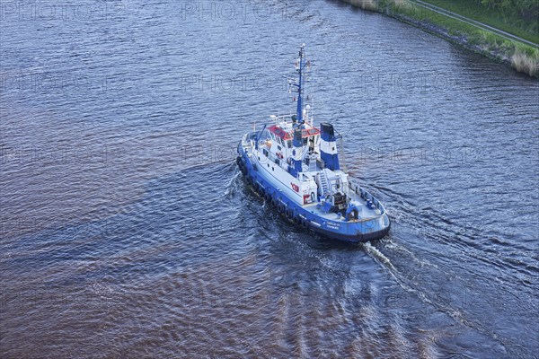 Bird's eye view of the Fairplay-54 tugboat on the Kiel Canal near Beldorf, Rendsburg-Eckernfoerde