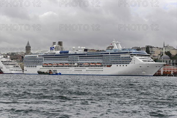 Cruise ship ISLAND PRINCESS, A white cruise ship against the historic backdrop of the Galata Tower