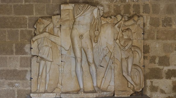 Heavily damaged antique relief with recognisable figures, interior view, Grand Master's Palace,