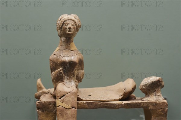 Antique terracotta statue of a woman, in detail view, interiors, Archaeological Museum, Old Town,