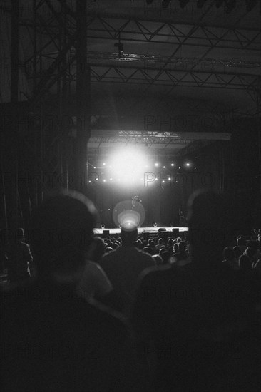 Acrobatic stage performance with audience in the foreground. Ehrenbreitstein Fortress, Koblenz