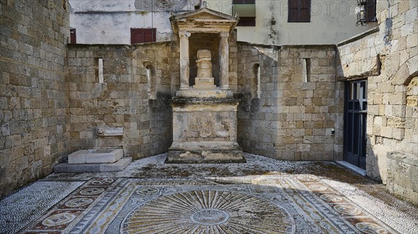 Doric columns at a historical site, temple pediment, sculpture with snake, detailed mosaic on the