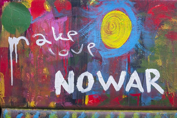 Lettering make Love No War, no war, colourfully painted vintage car, colour surface, Germany,