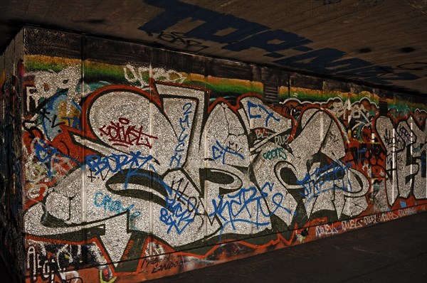 Graffiti wall in a skateboard park on the Thames, London, England, Great Britain