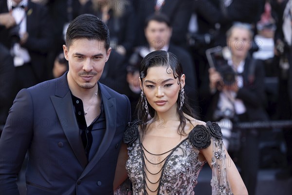 Cannes, France, 17.5.2024: Lewis Tan and Lucy Qiu at the premiere of Kinds of Kindness on the red