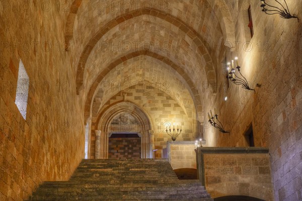Antique staircase with arches and candlesticks in a historic building, interior view, Grand