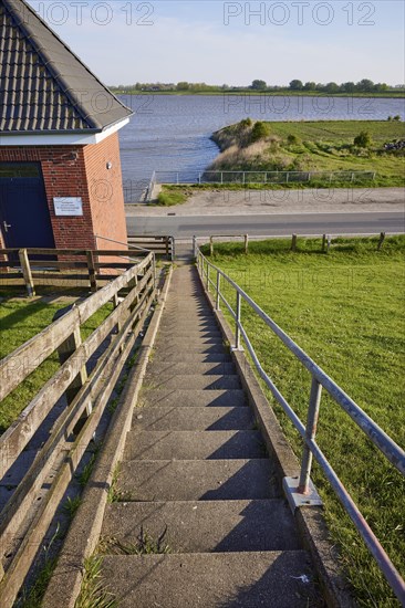 Steps to the dyke crest on the dyke near Tetenbuell, North Friesland district, Schleswig-Holstein,