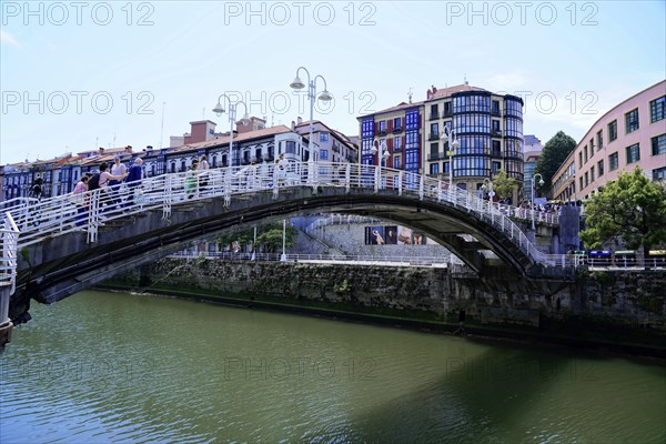 On the road in Bilbao, Bizkaia province, Basque Country, Spain, Europe, Stone bridge over a river