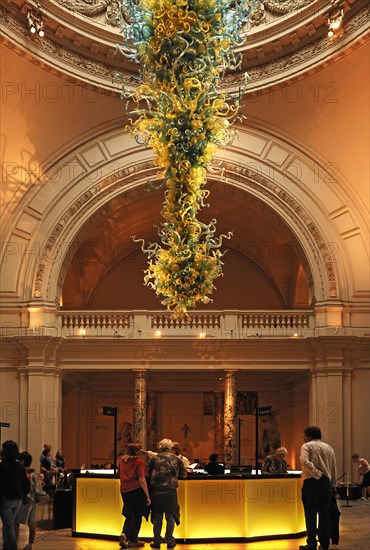 Artistic glass object in the reception hall with information stand of the Victoria & Albert Museum,