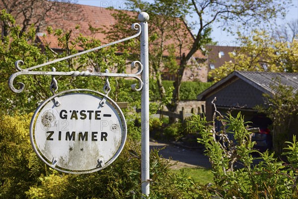 Old sign for guest rooms in Niebuell, district of Nordfriesland, Schleswig-Holstein, Germany,