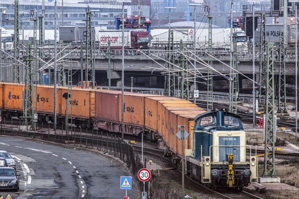 A locomotive pushes wagons with containers to Burchardkai in the Port of Hamburg, Hamburg,