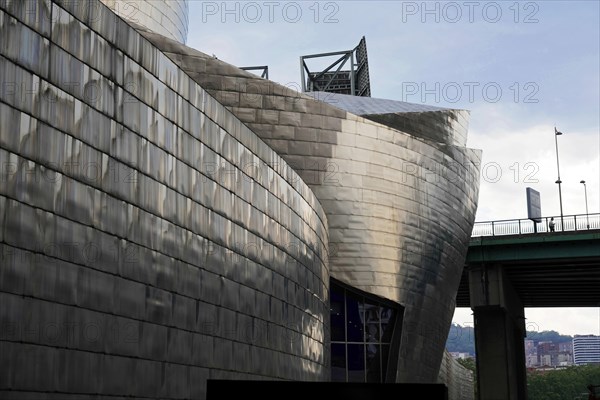 Guggenheim Museum Bilbao, Spain, Europe, Exterior view of a modern brushed steel building in an