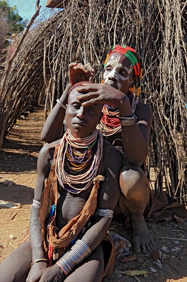 South Ethiopia, Omo region, among the Karo people, woman with jewellery and face painting styling