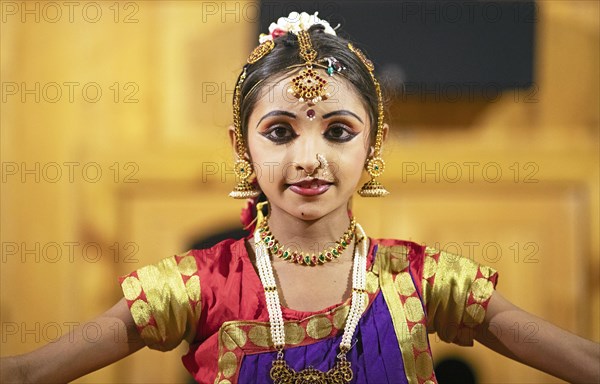 Indian dancer, 10 years old, dancing Indian classical dance, close-up, Thekkady, Kerala, India,