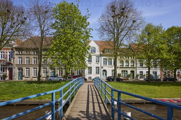 Houses and bridge over the Mittelburggraben in Friedrichstadt, Nordfriesland district,